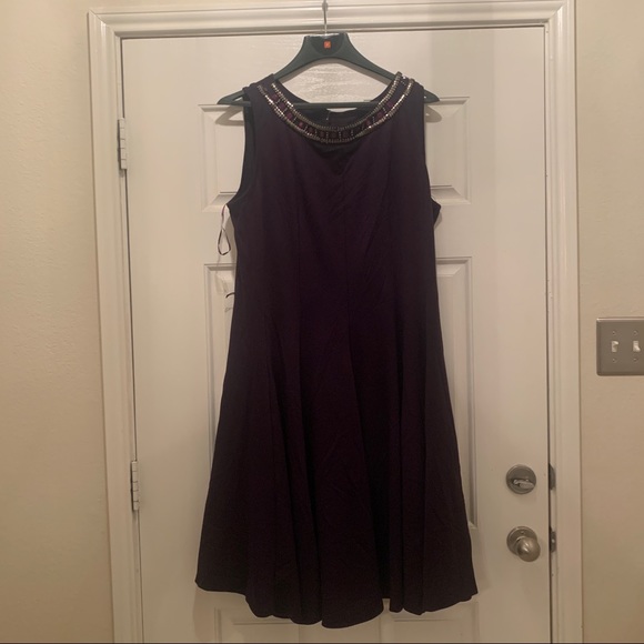 Hanni Dresses & Skirts - Purple Bejewled Flare Tail Dress